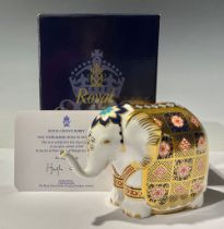 A Royal Crown Derby paperweight, The Yorkshire Rose Elephant, printed in the 1128 palette, exclusive