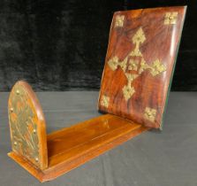 A Victorian brass mounted walnut and mahogany book slide, the folding pointed-arched ends applied