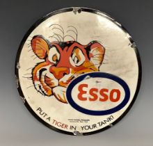 A reproduction enamelled circular advertising sign, Esso, Put A Tiger In Your Tank, approx. 30.5cm