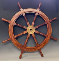 A contemporary hardwood and brass stained ship's wheel, approx. 91.5cm wide