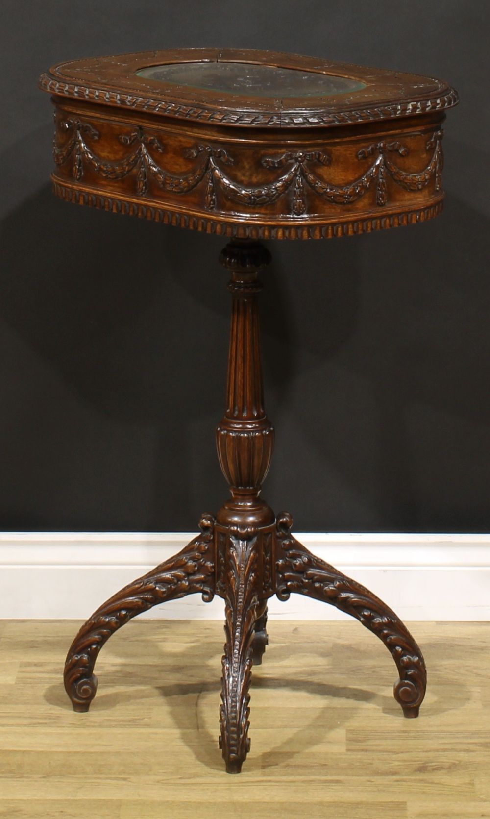 An Adam Revival mahogany work table, hinged top above a deep frieze carved and applied with ribbon- - Image 4 of 5