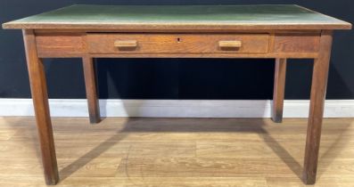 An early 20th century oak estate office writing table, 76cm high, 137cm wide, 76.5cm deep