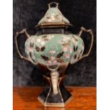 A Victorian Staffordshire shaped hexagonal pedestal samovar, painted with pink blossom on a green