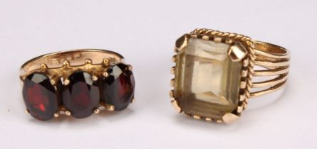 A 9ct gold ring set with a single faceted rectangular smoky quartz stone, size P, London 1979, 8g; a