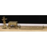 A 19th century style brass walking stick stand, 59cm high; a brass extendable fire curb or fender,