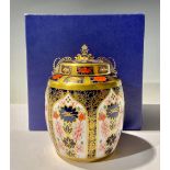 A Royal Crown Derby Imari 1128 pattern ginger jar and cover, 12cm, first quality, boxed