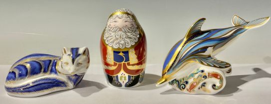 A Royal Crown Derby paperweight, Dolphin, gold stopper, 18cm long; others, Arctic Fox, gold stopper,