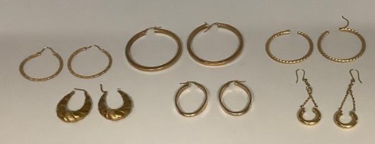 A pair of 9ct gold large hoop earrings, marked 375, 3.6g; five other pairs of hoop style earrings,