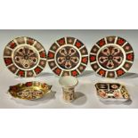 A set of three Royal Crown Derby Imari 1128 pattern tea plates; a shaped oval trinket tray with