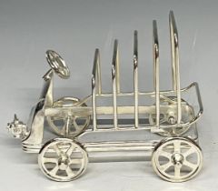 A silver plated novelty toast rack, in the form of a vintage car, 12cm high