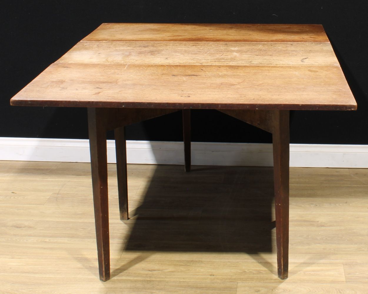 A 19th century mahogany double gateleg dining table, 73.5cm high, 50.5cm opening to 156cm long,