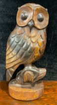 A large carving, of an owl, 46cm high