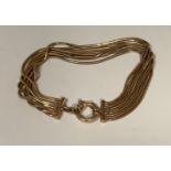 An Italian 9ct gold fancy link bracelet, marked 375, 14g