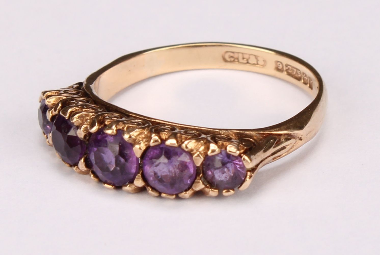 A five stone amethyst and 9ct gold ring, the graduated round fact cut stones claw set, size L, 2.93g - Image 3 of 7