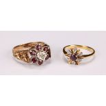 A ruby and diamond flowerhead ring, the central round facet cut stone claw set above six round facet