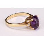 An 18ct gold amethyst and diamond ring, size N/O, Sheffield 1994, 3.8g