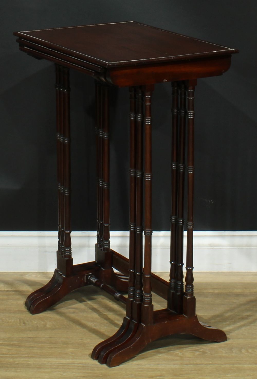 A nest of three George III Revival mahogany occasional tables, each with a rectangular top, turned - Image 4 of 5