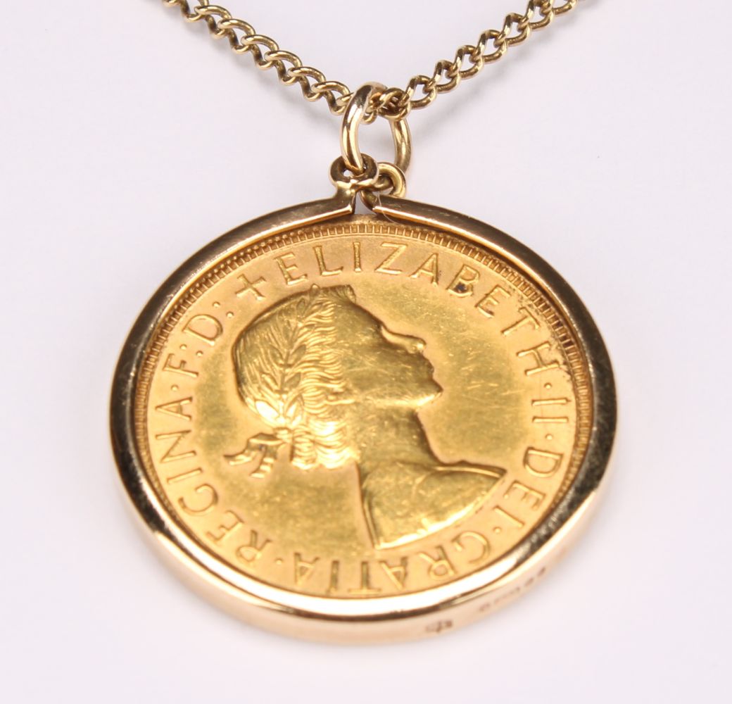 An Elizabeth II full gold sovereign, 1963, 9ct gold mounted as a pendant with 9ct gold necklace - Image 2 of 3