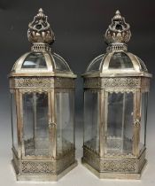 A pair of silver coloured metal crown top hexagonal lanterns, approx 70cm high over loop, 24cm