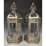 A pair of silver coloured metal crown top hexagonal lanterns, approx 70cm high over loop, 24cm