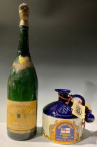 A ceramic flagon of British Navy Pusser's Rum, 1.75 litres, with contents; a Methuselah bottle of