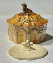 A 19th century salt glaze gothic revival tobacco jar, cover and doubter, moulded with gothic