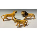 A Beswick Lion Family group, the father 23cm long, printed marks (3)