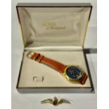 An Alfex of Switzerland Royal Air Force wristwatch, leather strap; a Royal Air Force brooch, with