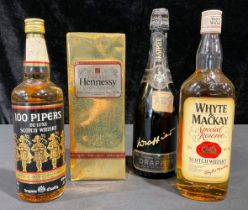A bottle of Hennessey Cognac, boxed; others, 100 Pipers Scotch whisky; Whyte & Mackay Scotch whisky;