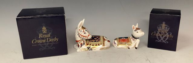 A pair of Royal Crown Derby paperweights, Thistle Donkey, one of a signature edition of 1,500 for