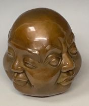 A bronzed metal lucky four faced Buddha desk weight, 11cm high, four character mark to base