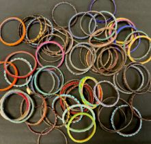 A collection of Tribal African beadwork and rattan bangles