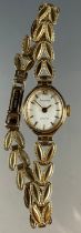 A lady's Accurist 9ct gold cased bracelet wristwatch, 3N20 quartz movement, ornate link 9ct gold