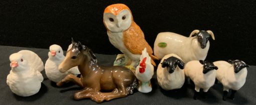 Beswick - Barn owl, 12cm high, black faced ram, two conforming smaller rams, recumbent brown glaze