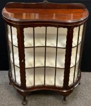 An early 20th century mahogany China cabinet / vitrine, quarter galleried back, shaped front with