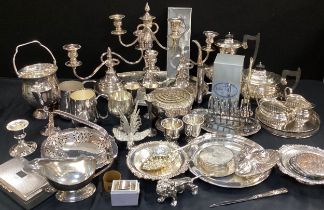 Plated ware including a pair of low candelabrum, one taller candelabra, four piece tea and coffee