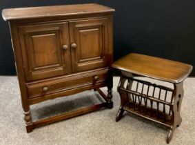 An Ercol ‘Old Colonial’ design, elm side / kitchen cupboard, rounded rectangular top with plate