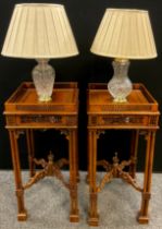 A pair of Chinoiserie Chippendale style lamp tables, pierced galleried top, and frieze, turned
