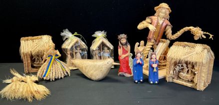 A quantity of straw work pieces depicting Christmas scenes, angels and crinoline lady; etc (9)