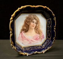 A 20th century continental porcelain canted square bowl, decorsated with a portrait of a curly raven