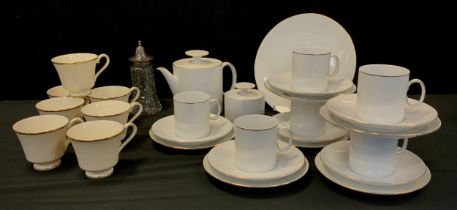 A Thomas Germany white and gilt tea set, for six, Edwardian silver topped cut glass sugar caster,