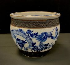 A Chinese blue and white crackled planter, 22cm high, 27cm diameter.