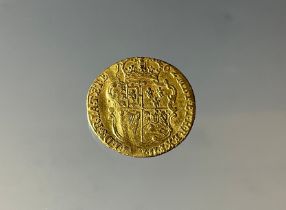 A George III quarter guinea, 1762, 2.1g,