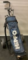 Golfing - a set of Howson Enforcer golf clubs, Hippo golf bag, folding two wheeled cart carrier.