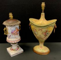 A 19th century porcelain urn, decorated with Cherubs and a Dove, floral surround and panels,