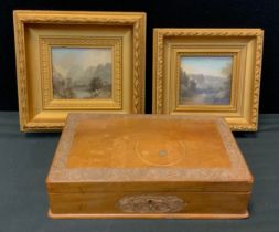 A 20th century carved rectangular trinket box, 28cm long, two oil paintings of Devon on board in