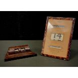 A 20th century art deco perpetual calendar, Bakelite frame, 16cm x 11cm, other 12cm long (2)