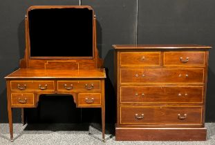 An Edwardian mahogany dressing table, 159cm high, 115cm wide, 53cm deep; a similar chest, of two