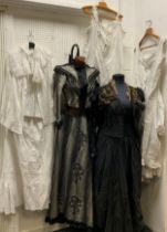 A collection of Victorian clothing and attire comprised, pin striped long skirt and matching blouse,