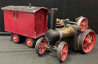 A Mamod TE1A Live Steam engine, brass body, rubber ring tracked front and rear wheels., no canopy,